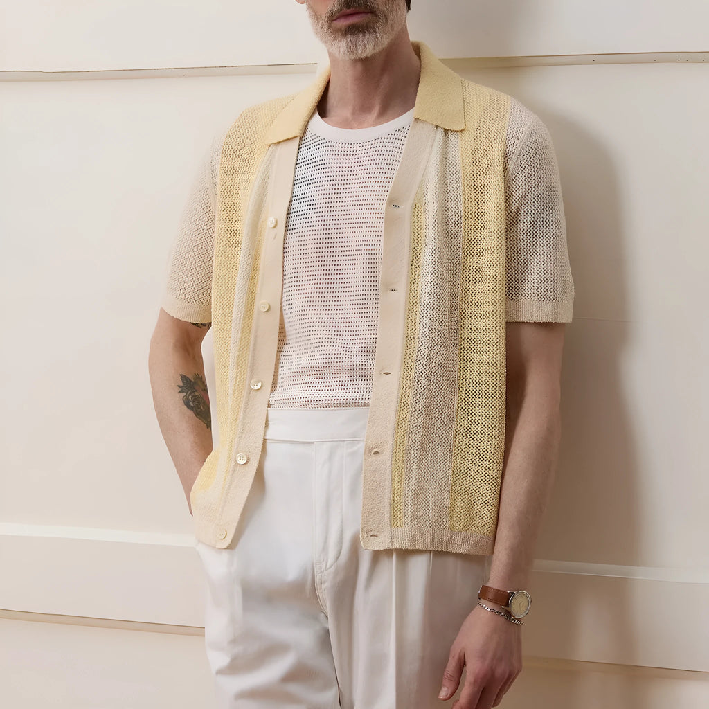 Yellow men's casual polo shirt with asymmetric design and short sleeves made from Tencel fabric.