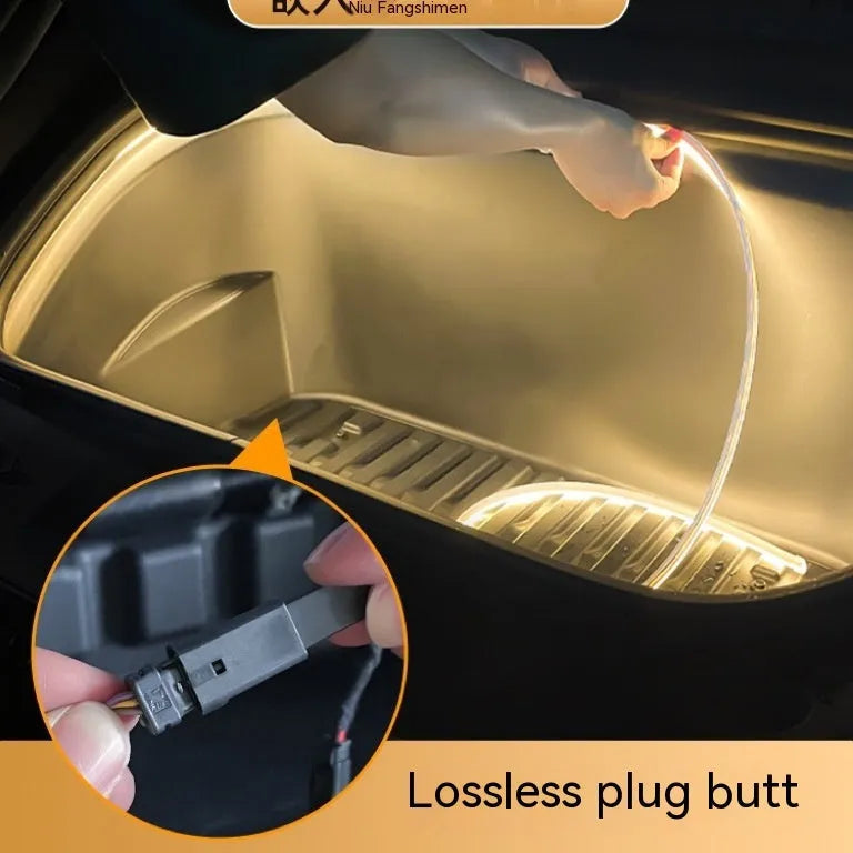 Tesla Model 3 and Y front centre console LED ambience light kit in soft silicone with ice blue, pure white, and warm white colour options.