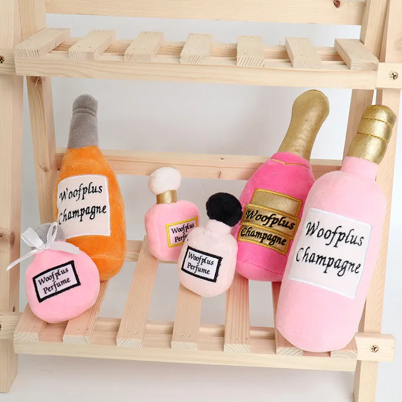 Plush wine bottle shaped dog toy with squeaker in various colour options