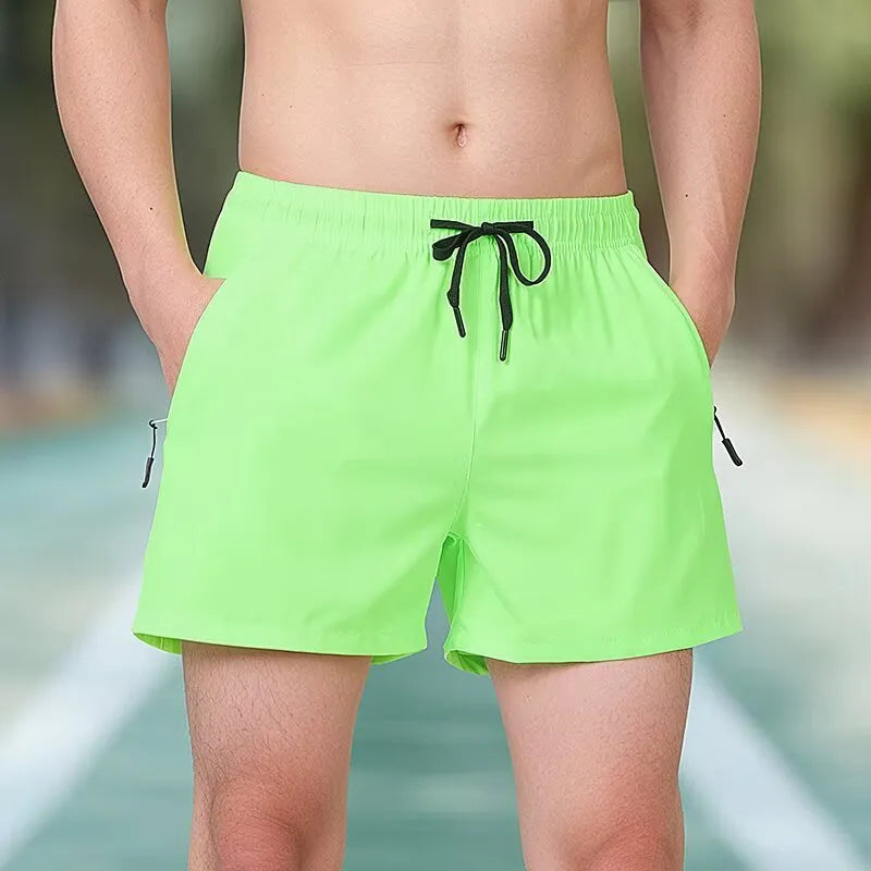 Men's black polyester training shorts with high waist design and drawstring closure for fitness activities