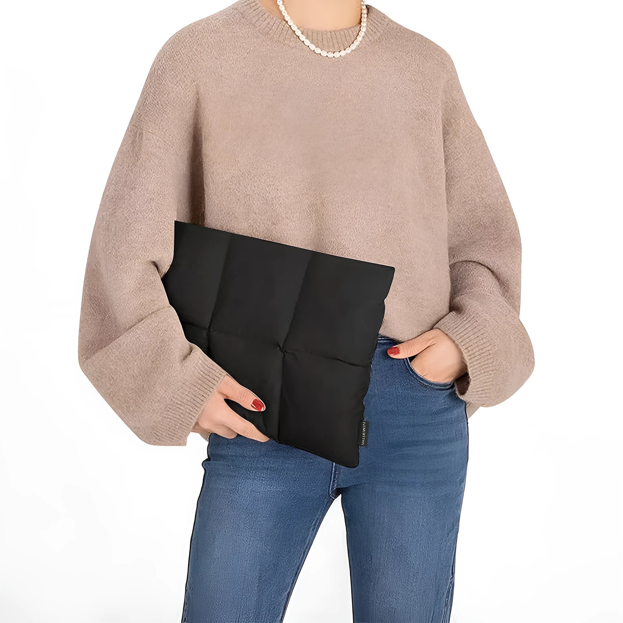 Soft fluffy polyester laptop sleeve in black and khaki colours on a table, showing sewing thread detail and size options.