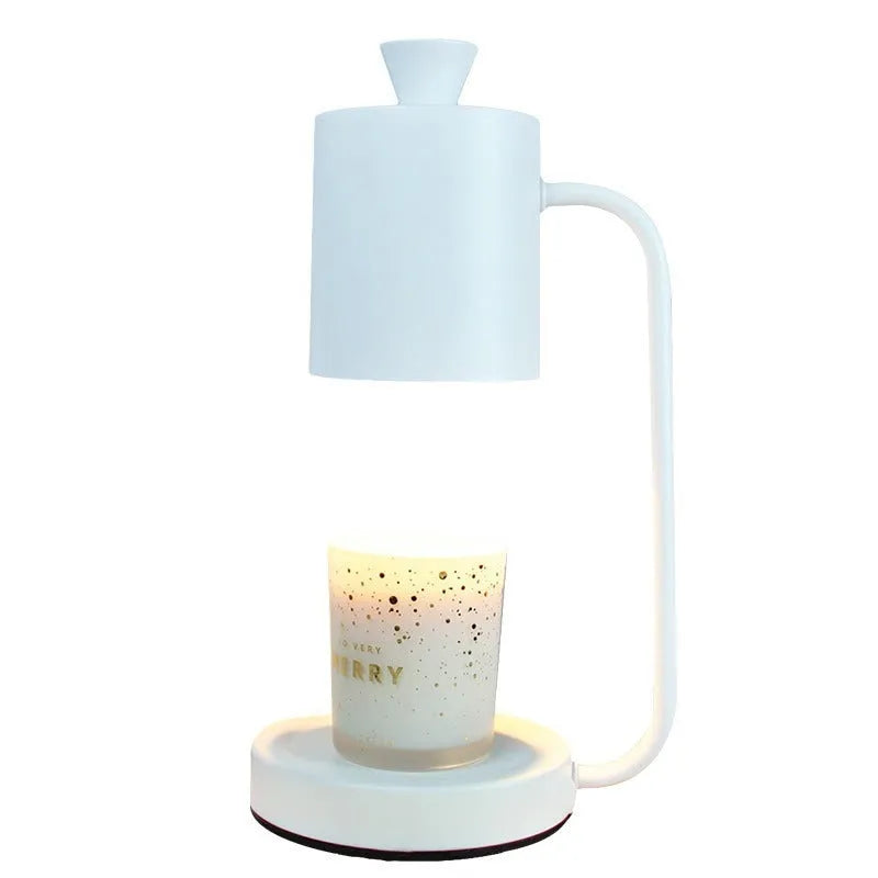 White European-style metal aromatherapy wax melt lamp with a dimmer switch on a table.