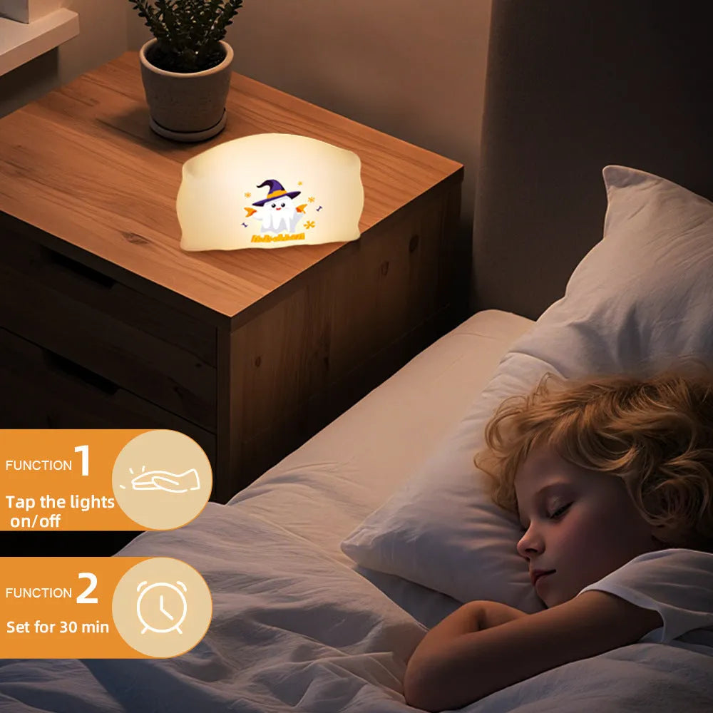 Small cartoon Halloween table lamp in Magic Ghost or Pumpkin Ghost colour on a bedside table.
