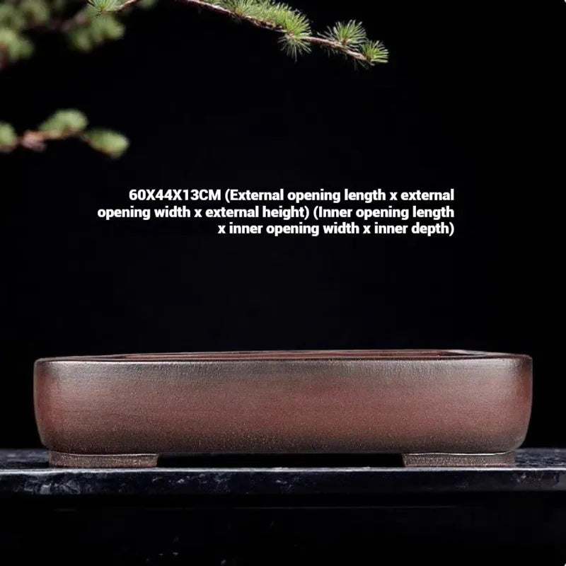 Handmade rectangular antique purple clay flower pot showing its size and textured finish.
