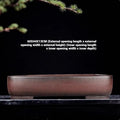 Handmade rectangular antique purple clay flower pot showing its size and textured finish.