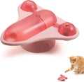 Blue interactive pet puzzle feeder toy with bell, catnip pouch, and central snack cabin on a floor.