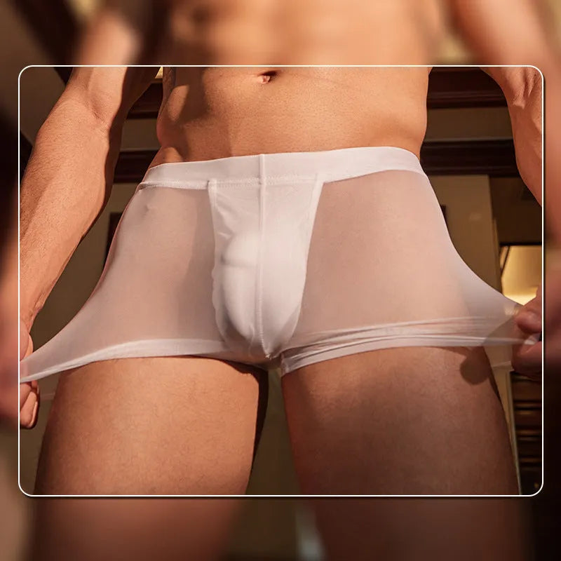 Men's black and white ultra-thin nylon boxer briefs laid flat, showing free size fit.