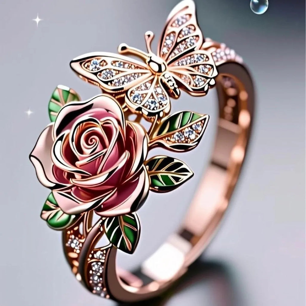 Adjustable alloy butterfly ring with oil-drip colour finish showing floral and insect details