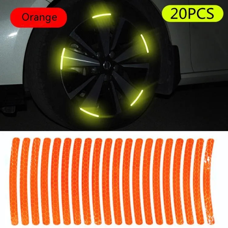 Pack of 20 arc-shaped reflective PVC stickers for car wheel hubs in various fluorescent and metallic colours