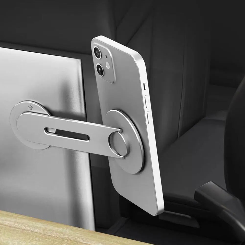 Silver CNC aluminum magnetic phone holder hidden behind Tesla suspension screen with 180 degree flip