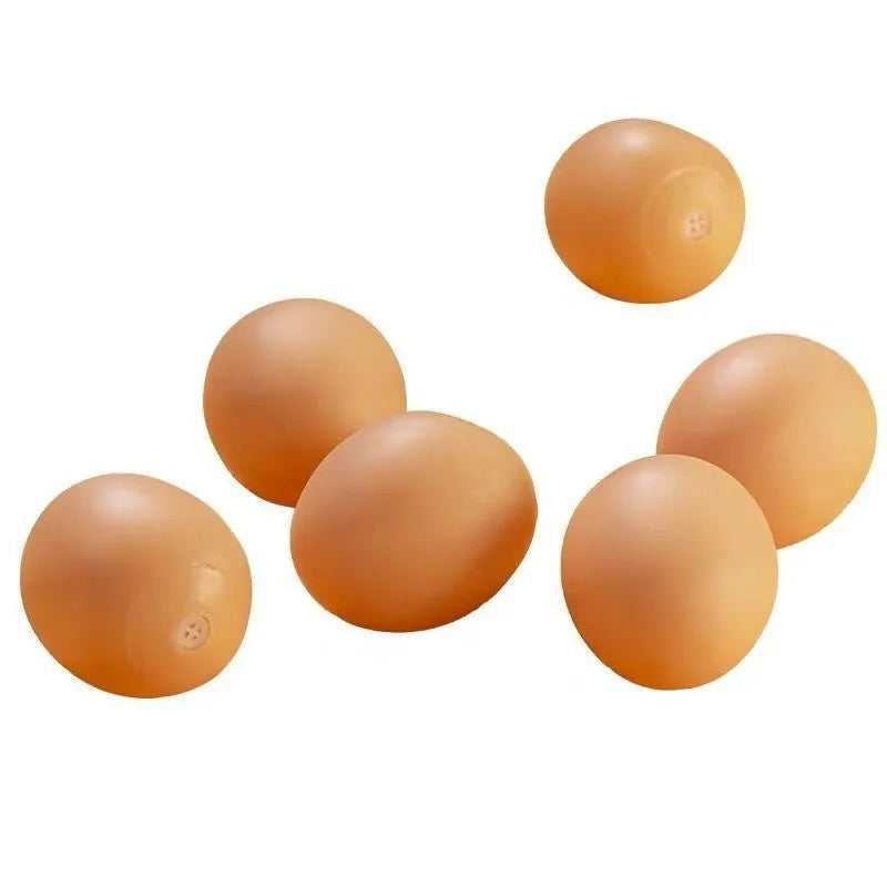 Orange rubber egg-shaped dog chew toy with crinkly sound for small medium breeds