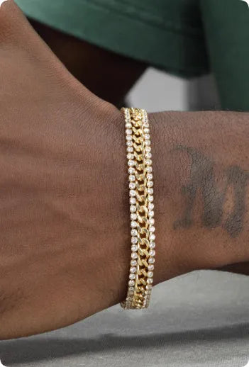 Gold tennis bracelet with gemstone inlay on titanium steel band.