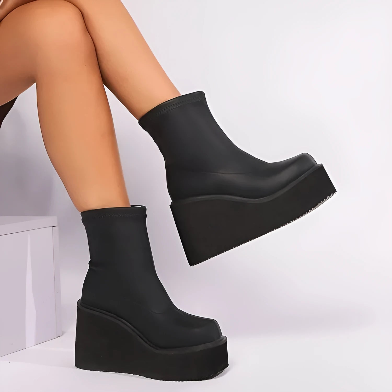 Plus size women's wedge heel boots with waterproof platform sole in black artificial PU leather
