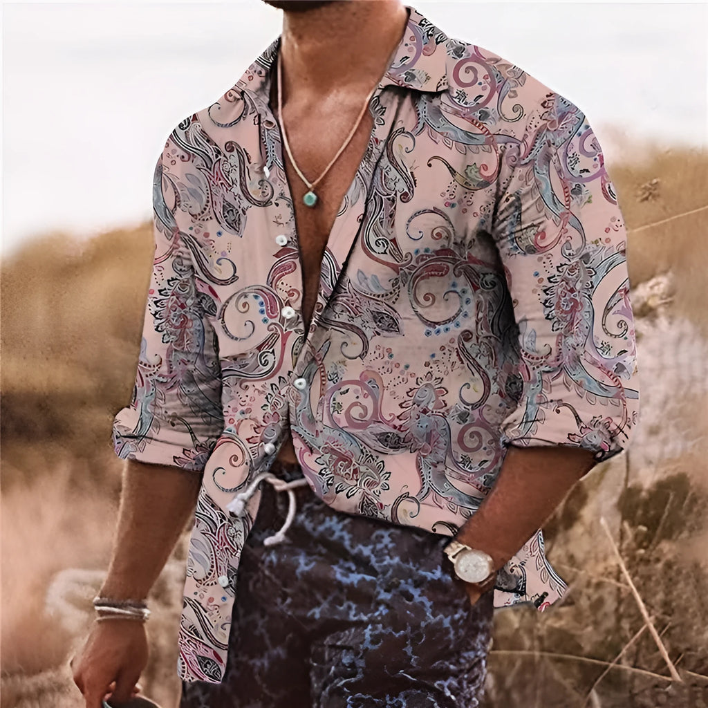 Man wearing a loose-fit long-sleeved shirt with a colourful 3D digital printed flower pattern.