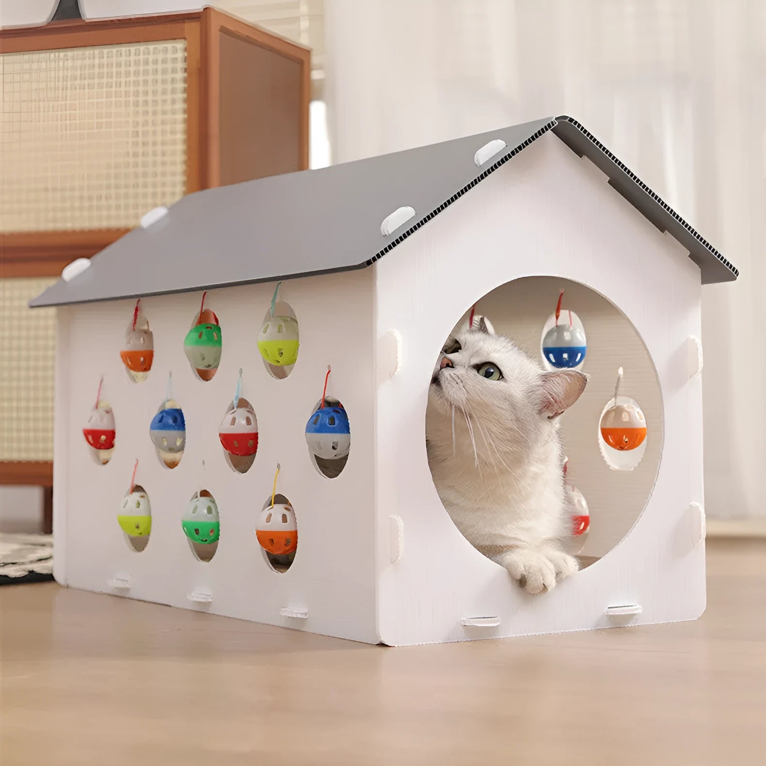 Plastic cat scratch board with integrated nest and bell ball tunnel for house cats