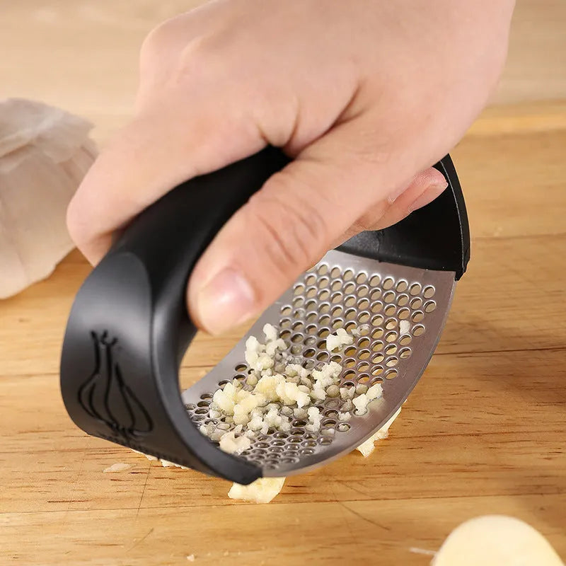 304 stainless steel garlic press in black, blue, green, or pink with modern design