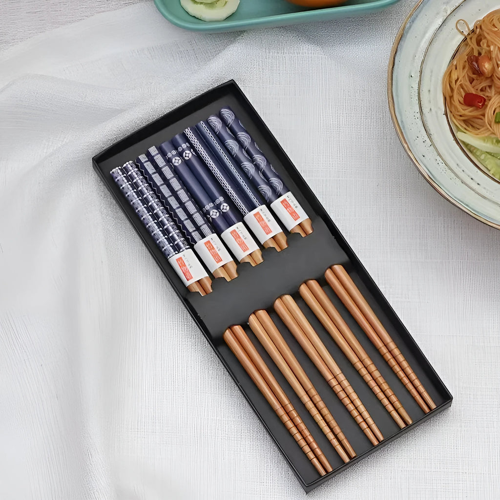 Set of five Japanese-style patterned bamboo chopsticks with lucky cat or elegant blue design.