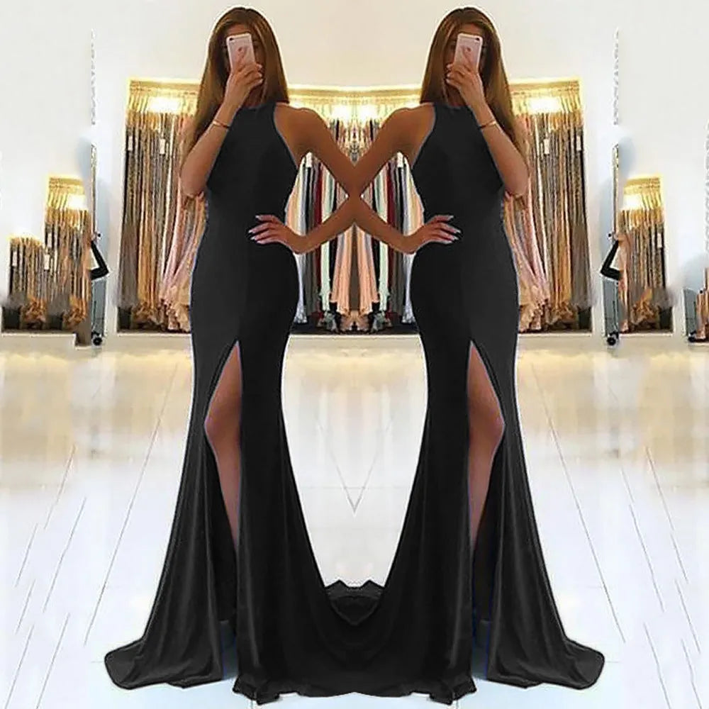 Red knitted evening dress with high waist, long swing skirt, and hollow design detail on mannequin