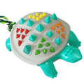 Natural rubber dog toothbrush chew toy with dinosaur knot design in mint flavour for dental care