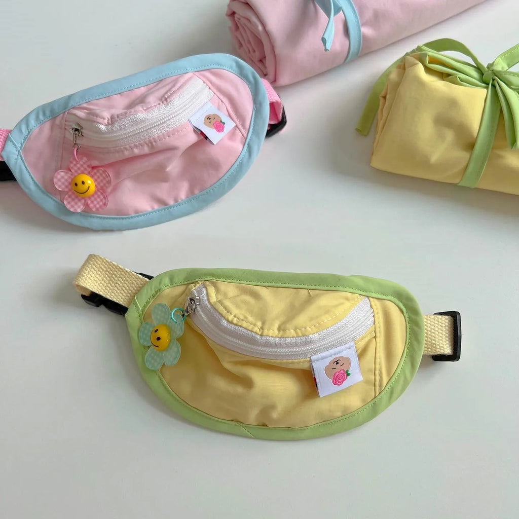 Powder blue, yellow, and green backpack-style messenger bag dog and cat carrier.
