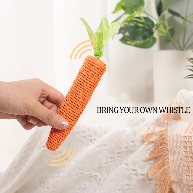 Assortment of cat toys including carrot-shaped bites, crinkly paper toys, ringing stones, sticks, and tooth grinding sticks.