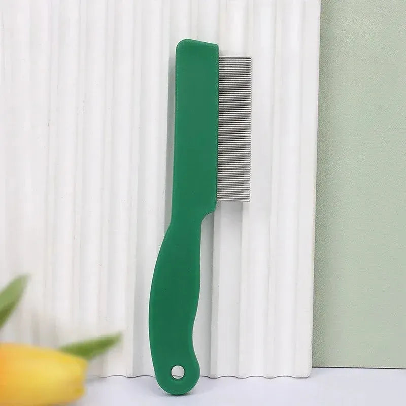Green plastic-handled flea comb with stainless steel pins for dog and cat grooming.