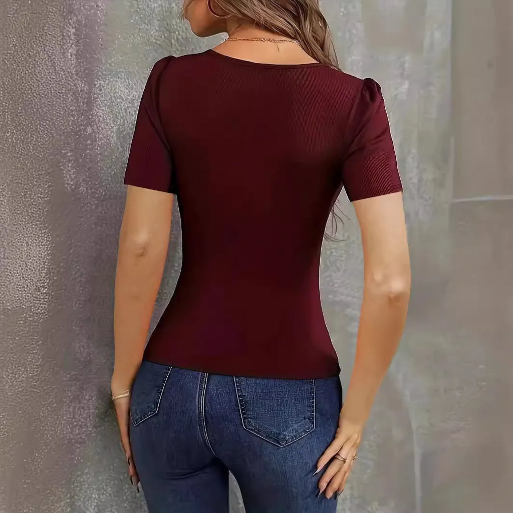 Women's slim fit knitted short sleeve top in polyester fabric with low neckline