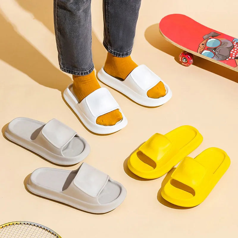Unisex thickened EVA flip-flop slippers in black with a non-slip sole for bathroom use.