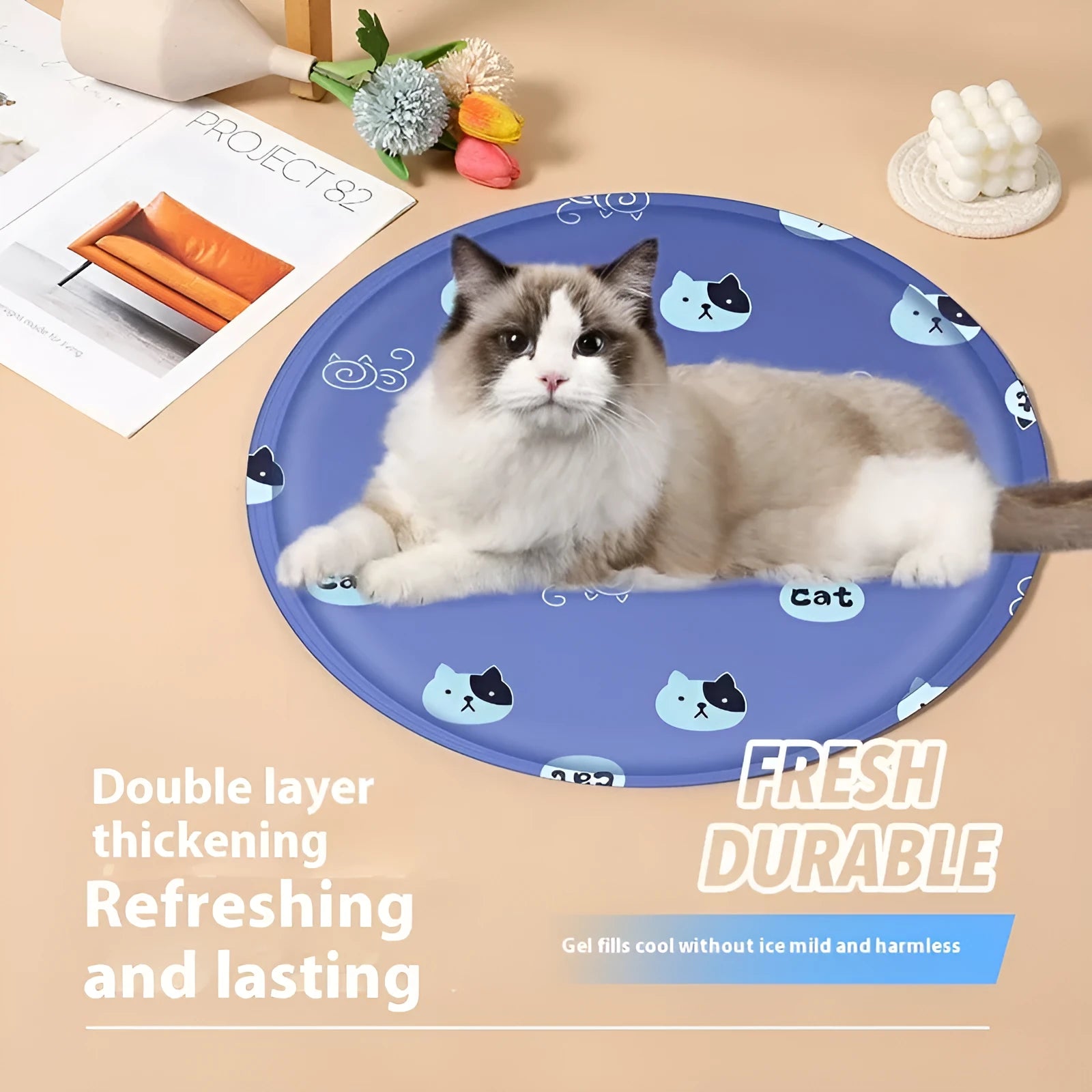 Round cloth pet cooling mat with cartoon dog design, shown in beige and blue colour options.