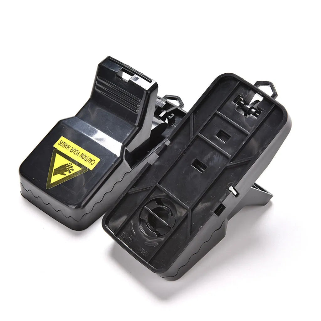 Six black snapping mousetraps made from alloy plastic with dimensions 11cm by 5cm