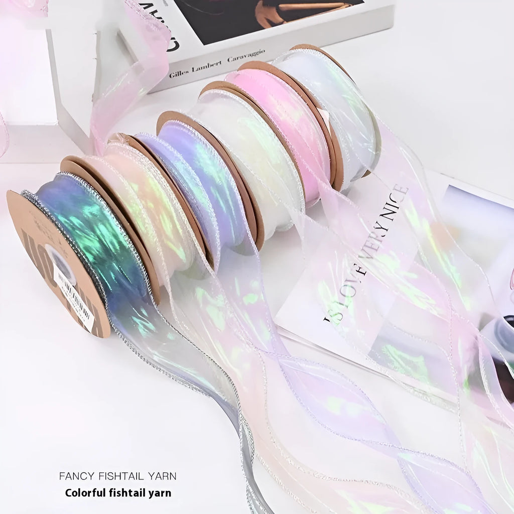Fishtail yarn floral ribbon roll in mesh material with wave edge pattern measuring 4cm wide