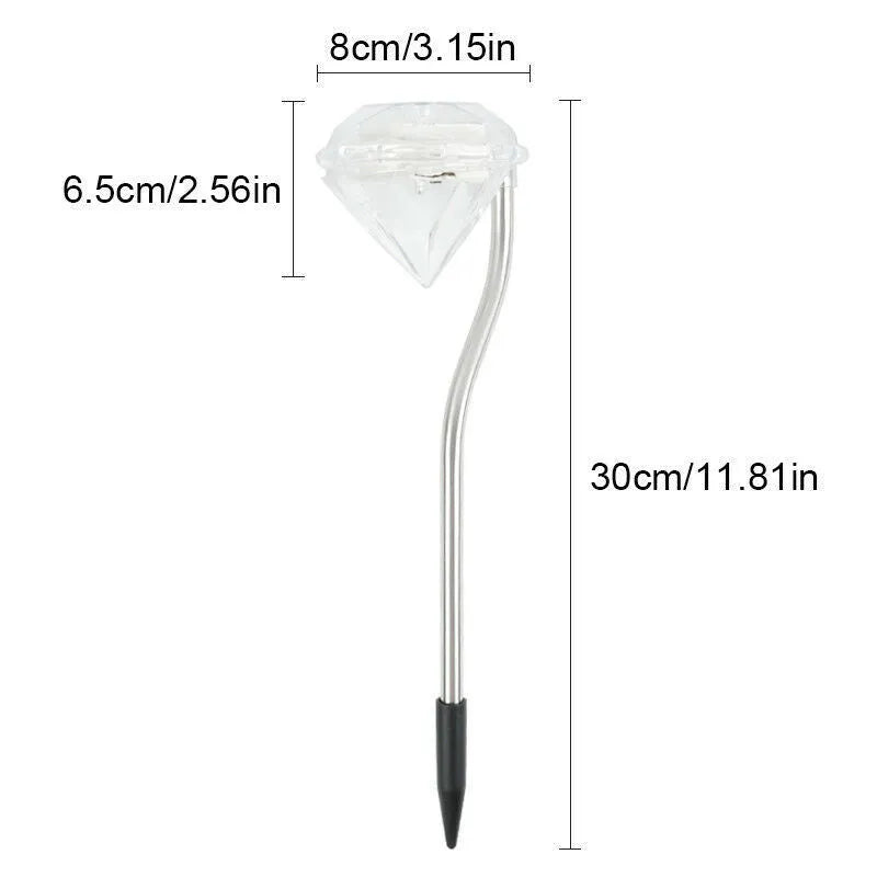 White solar-powered LED garden spotlight with adjustable angle and solar panel on a stake.