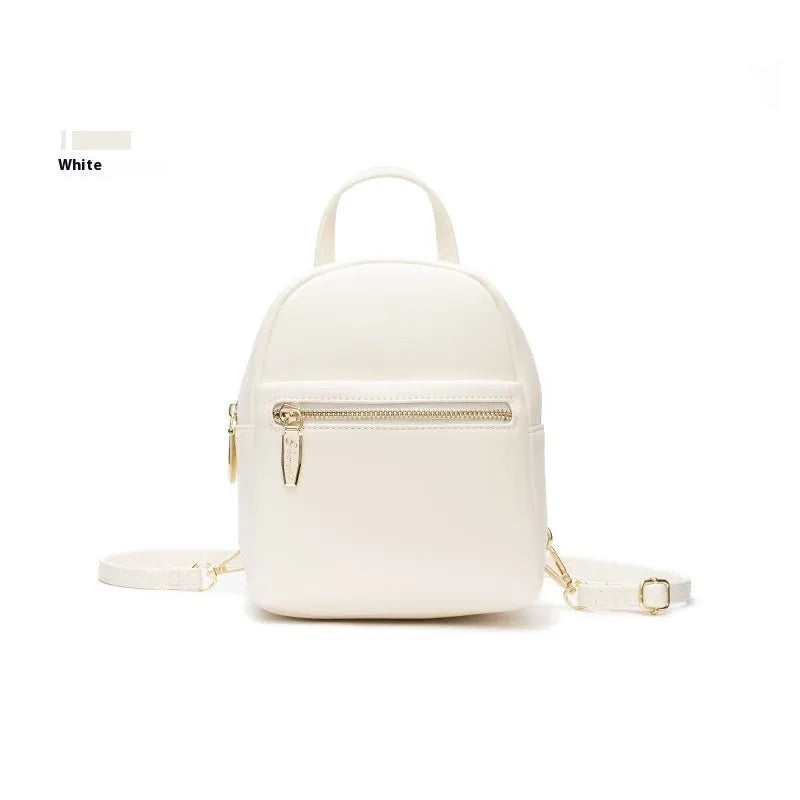 Soft PU mini backpack in street style with contrast colour detailing and three-dimensional pocket