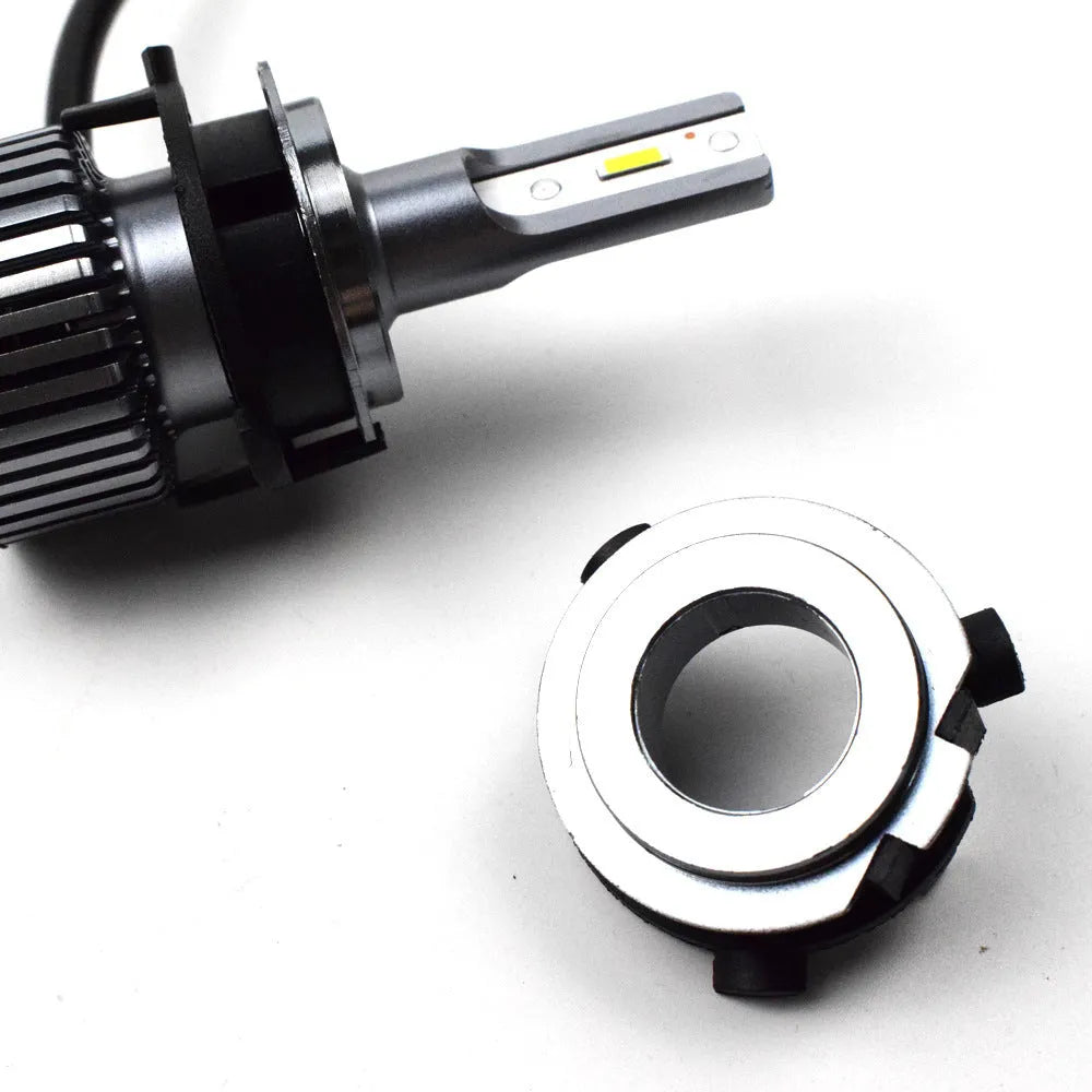 White ABS plastic car LED headlight card holder with dimensions 3.8cm by 3.7cm.