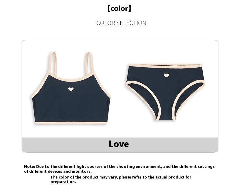 Dark blue girls' split swimsuit briefs made from high elasticity polyester fabric for swimming.