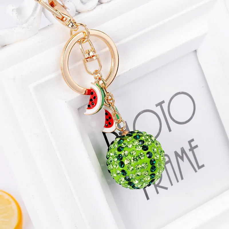 Green watermelon slice keychain made from zinc alloy measuring 12cm long
