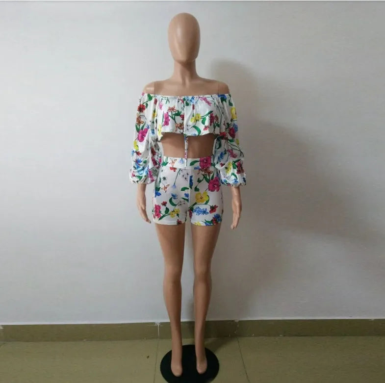 Women's two-piece outfit with digital printing pattern showing long sleeve top with pile sleeves and matching shorts
