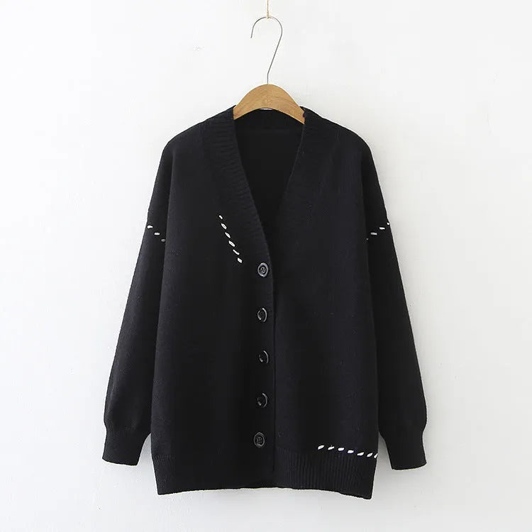 Women's black knitted cardigan coat with long sleeves and loose fit