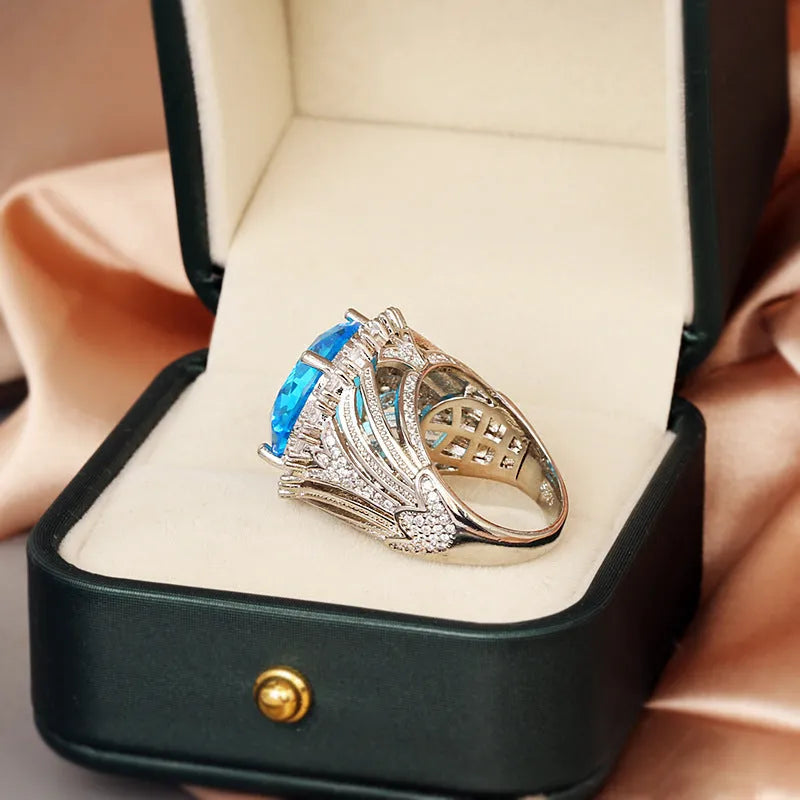 Italian court style hollow brass women's ring with white steel plating showing retro design details