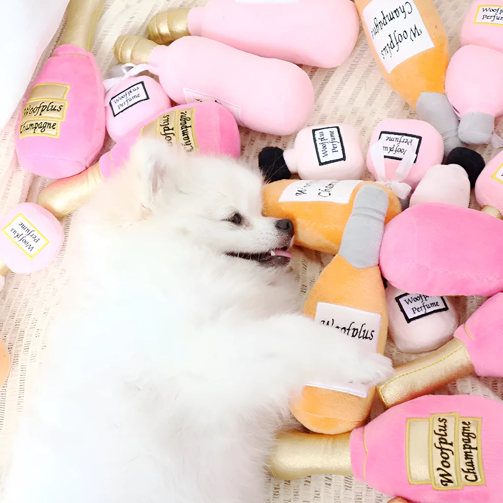 Plush wine bottle shaped dog toy with squeaker in various colour options