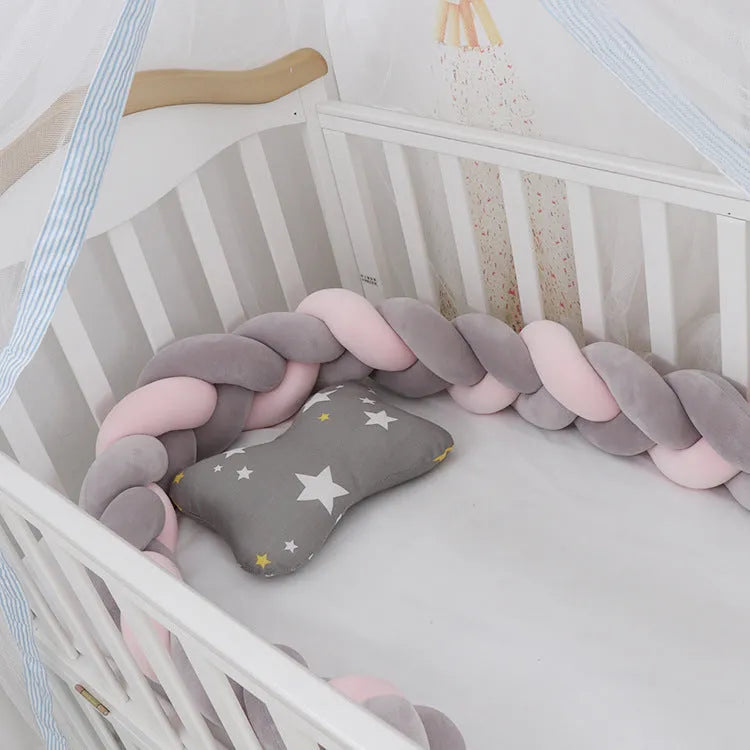 Baby crib bumper in crystal velvet with braid knot design showing flexible length options for cot protection