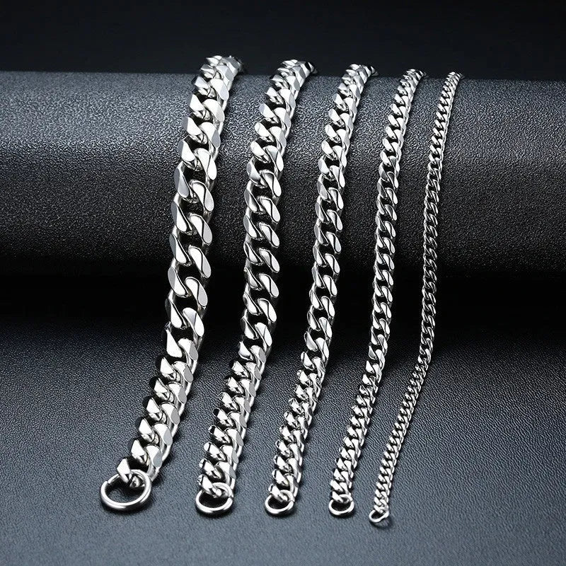Gold six-sided geometric Cuban link metal bracelet on wrist, showing textured chain design.