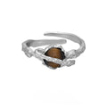 Saturn design adjustable silver open ring with white gold electroplating and tigereye pattern