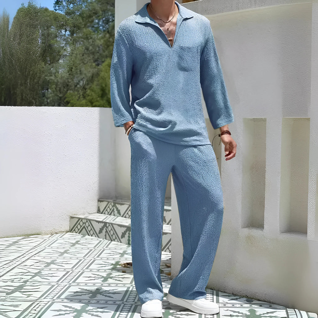 Men's casual shirt and trouser suit set in polyester fabric available in four colours.