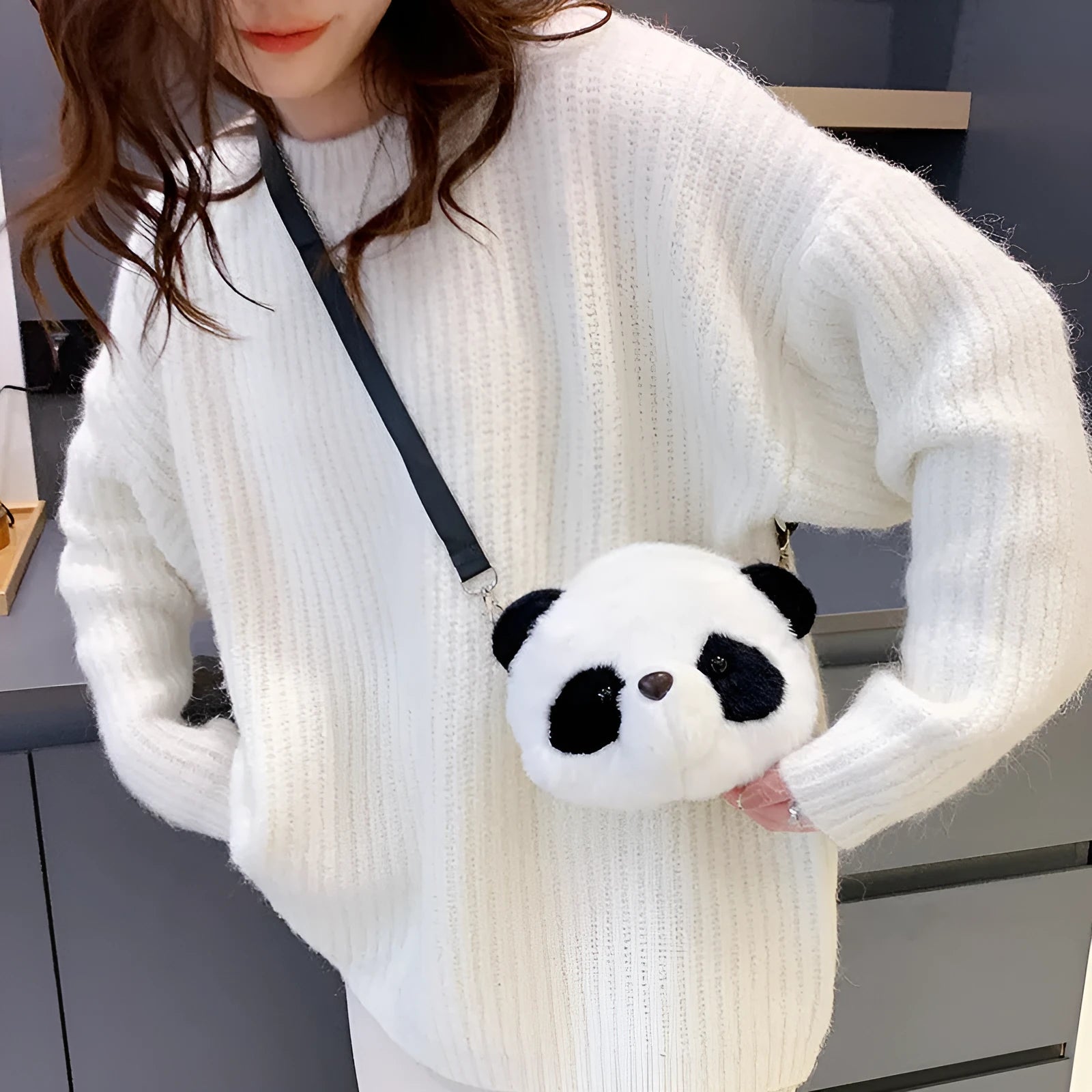 Panda head design plush crossbody bag with cylindrical shape and sandwich pocket
