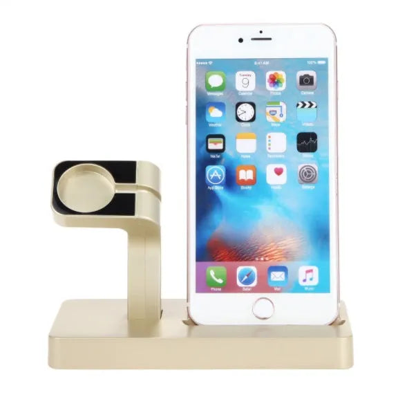 White 2-in-1 charging dock station holding an iPhone and an Apple Watch on a wooden desk.