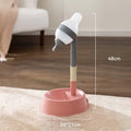 Grey adjustable height pet water dispenser with detachable pole and separate bowl on a wooden floor.