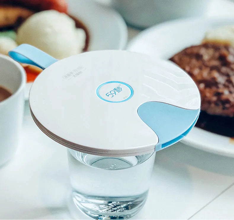 Slim blue portable UV-C baby bottle steriliser showing USB port and dimensions