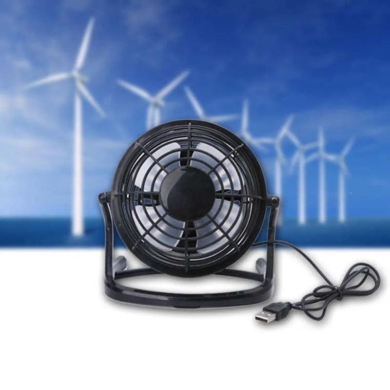 Black and white mini portable USB fan with adjustable angle for laptop and desktop cooling