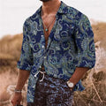 Man wearing a loose-fit long-sleeved shirt with a colourful 3D digital printed flower pattern.